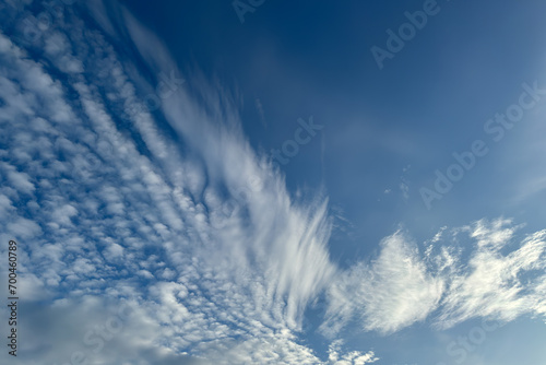 Beautiful cirrus clouds on a blue sky on a sunny day