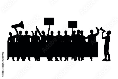 Silhouette of a group of men demonstrating in protest carrying a banner