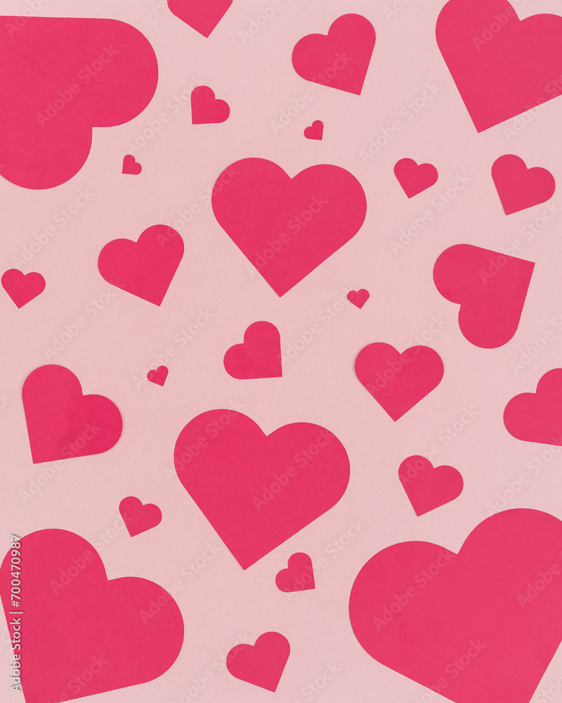 Valentine's Day Pink Background filled with Big and Small Red Hearts