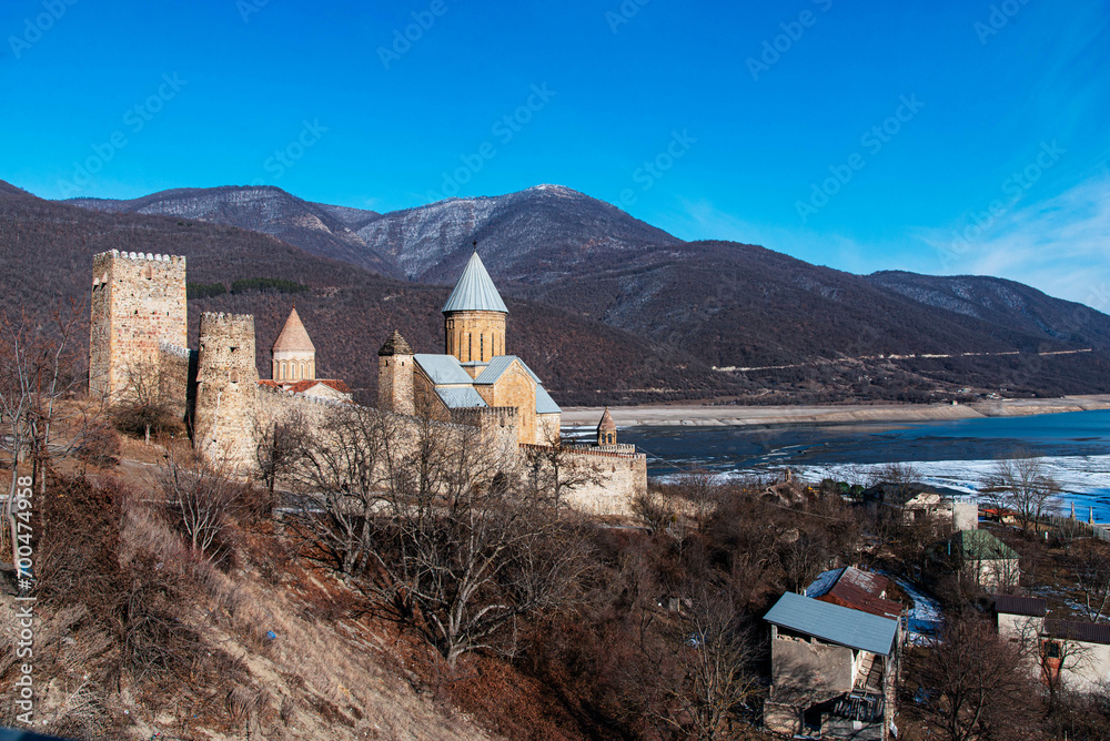 Beautiful scenic view from Ananuri fortress Georgia on Aragvi river and Zhinvali reservoir in winter season.