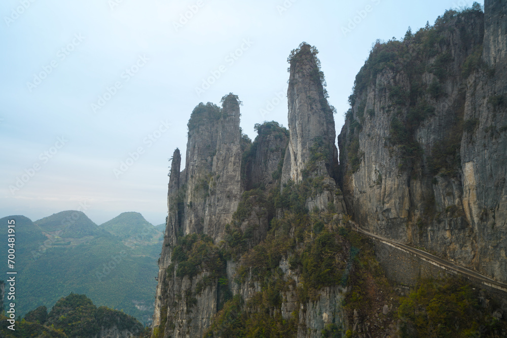 A mountain of huge pillars formed from Triassic limestone. Enshi Grand Canyon Qixingzhai Scenic Area, Enshi City, Hubei, China. A mountain of huge pillars formed from Triassic limestone. Enshi Grand Canyon Qixingzhai Scenic Area, Enshi City, Hubei, China.