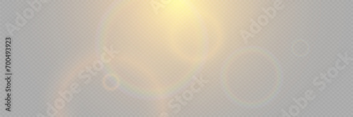 Bright light with glare and reflection of the camera lens. Sun, sun rays, dawn, lens flare on a transparent background.