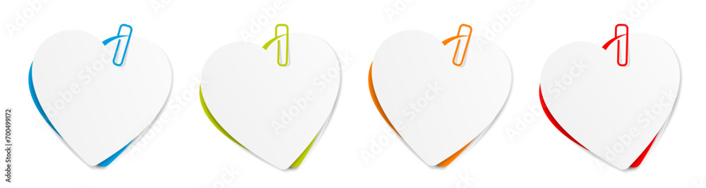 Several heart-shaped memo sheets held by a paper clip - obrazy, fototapety, plakaty 