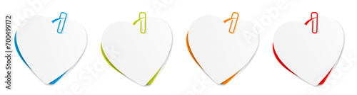 Several heart-shaped memo sheets held by a paper clip