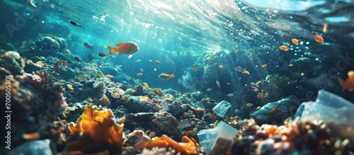 A plastic bottle floats in the Pacific Ocean Plastics break down into tiny pieces which enter the food chain and can be harmful to many species including humans. Creative Banner. Copyspace image