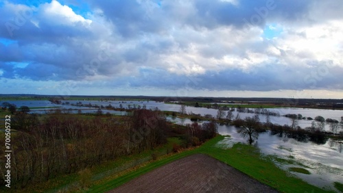 Fototapeta Naklejka Na Ścianę i Meble -  Northern Germany - Floods - Aerial view over large flood area - Land under water in inland northern Germany