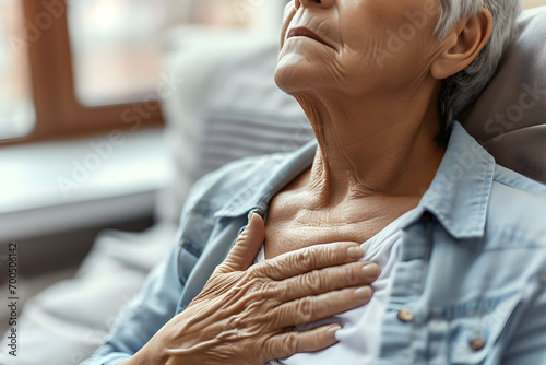 Caucasian woman with chest pain. Heart attack patient.