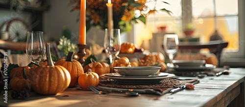 Beautiful table setting for Thanksgiving Day dinner at home. Creative Banner. Copyspace image