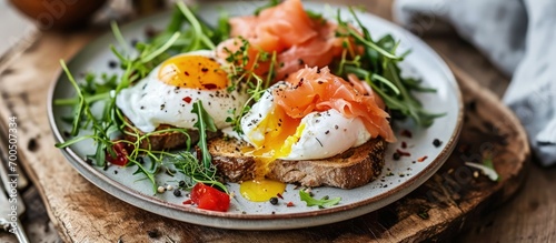 Luxury breakfast brunch and food recipe poached eggs with salmon and greens on gluten free toast for restaurant menu and gastronomy branding. Creative Banner. Copyspace image photo