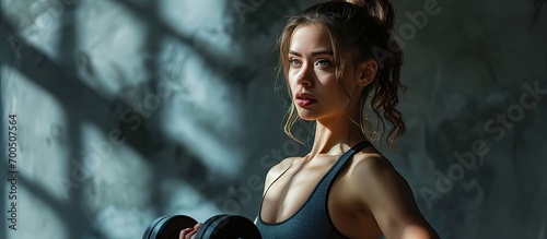 Beautiful young girl doing exercises at home. Creative Banner. Copyspace image photo