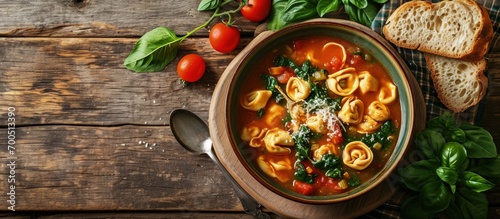 Homemade Creamy Tortellini The Soup with Chicken and Tomato. Creative Banner. Copyspace image