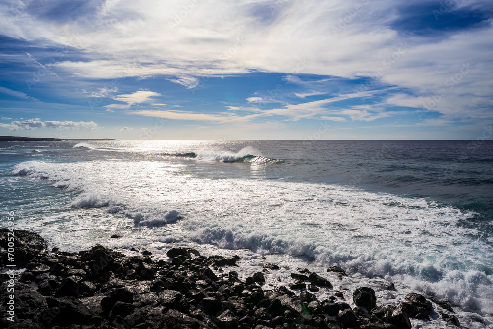 Seascape. Rocky shore of a raging ocean. Lanzarote, Canary Islands. Spain. Seascape. Rocky shore of a raging ocean. Lanzarote, Canary Islands. Spain.
