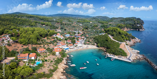 Panoramic aerial view to the idyllic fishing village of Katigiorgis, South Pelion, Greece, with turquoise, clear sea