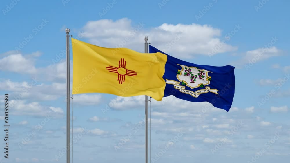 Connecticut and New Mexico US state flags waving together on cloudy sky, endless seamless loop Connecticut and New Mexico US state flags waving together on cloudy sky, endless seamless loop
