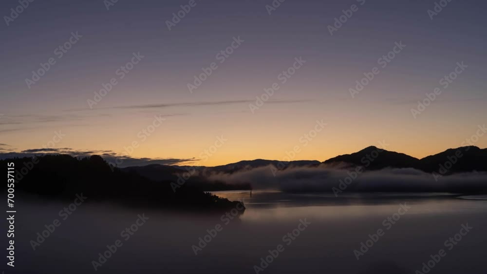 Timelapse, sunrise and fog in a norwegian fjord Timelapse, sunrise and fog in a norwegian fjord