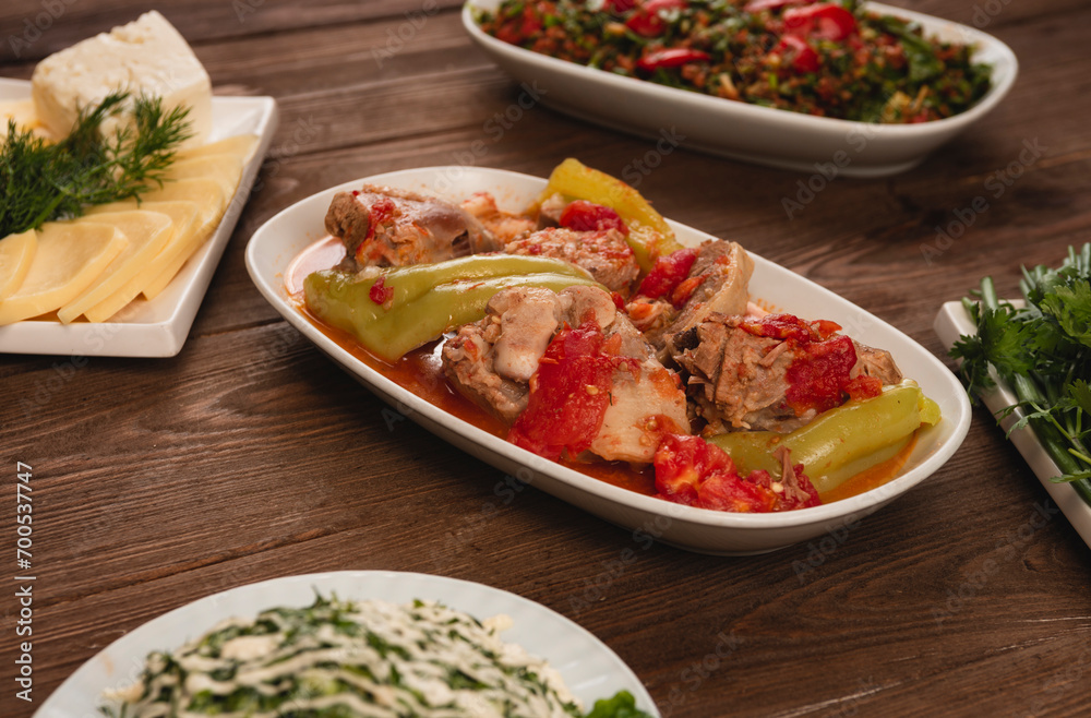 Traditional Armenian ,Turkish and Greek dinner appetizer platter on wooden table. Traditional Armenian ,Turkish and Greek dinner appetizer platter on wooden table.