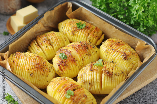 Hasselback potatoes - typical Swedish cuisine photo