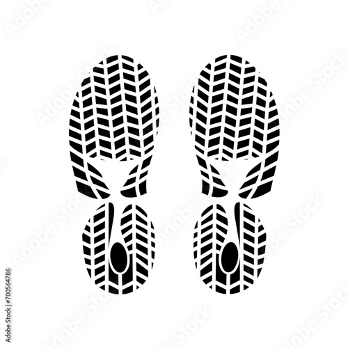 Vector silhouette of two printed sneakers on a white background. Great shoe vector for sports and travel posters.