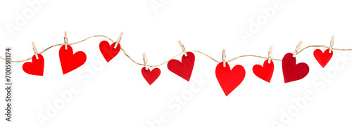 garland of hearts on clothespins on a white isolated background, decoration for valentine's day