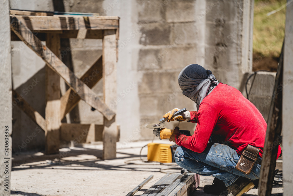 horizontal image of crouched person working horizontal image of crouched person working