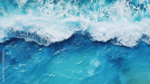 blue ocean small waves as background. top view, drone footage 