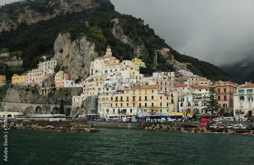 Waterfront Of Amalfi Italy On A Wonderful Spring Day With A Few Clouds In The Sky