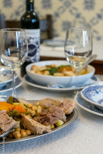 Authentic Alentejo Portuguese cuisine: 'Cozido à Portuguesa,' a hearty traditional dish with a mix of meats and vegetables.