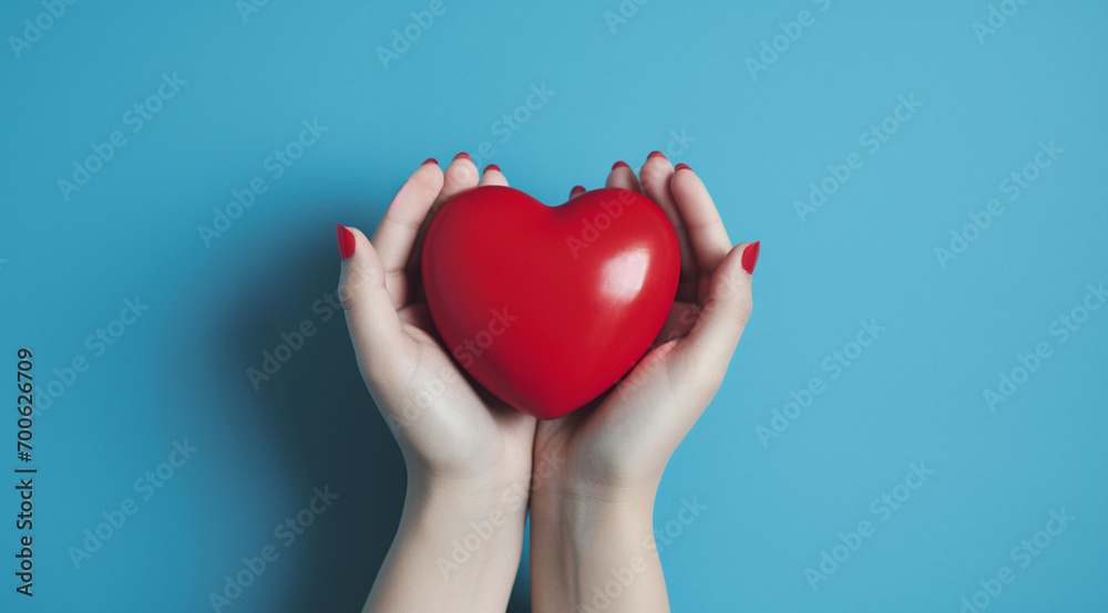 The essence of love with hands presenting a red heart on a serene blue background, an eloquent symbol of affection. Generative AI. The essence of love with hands presenting a red heart on a serene blue background, an eloquent symbol of affection. Generative AI.