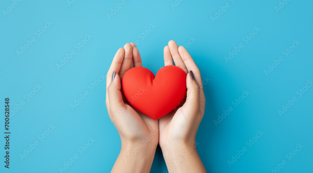 The essence of love with hands presenting a red heart on a serene blue background, an eloquent symbol of affection. Generative AI.