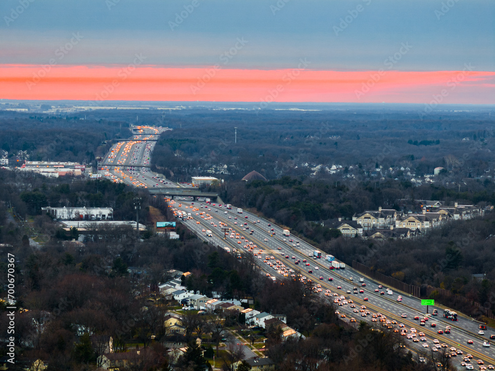 Obraz premium Aerial shot of a busy highway during sunset