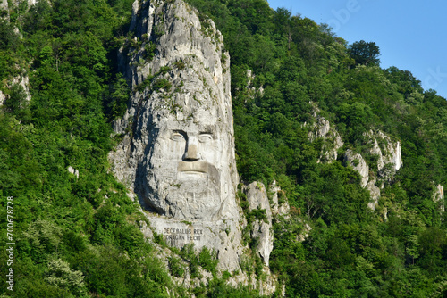 Carpathian mountains, Romania - june 29 2023 : Decebalus rock sculpture photo