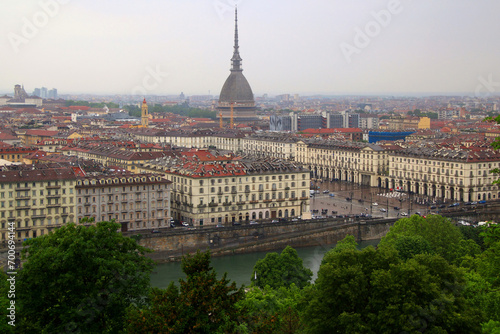 Aerial view of the city of Turin (Torino, Italy) with Piazza Vittorio Veneto, the Po River and the dome of the Mole Antonelliana in the background during rain