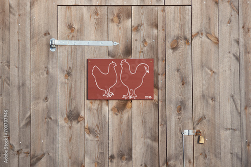 Entrance door to chicken coop in Bredebolet in Skaraborg in Vaestra Goetaland in Sweden photo