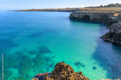 The most beautiful Apulian coast in Italy: Cala Corvino. Typical coastline near Monopoli : high and rocky coast characterized by small sandy coves with cliffs, rocky arches and sea caves.