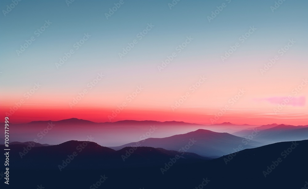 Fototapeta premium A view of a sunset over a mountain range