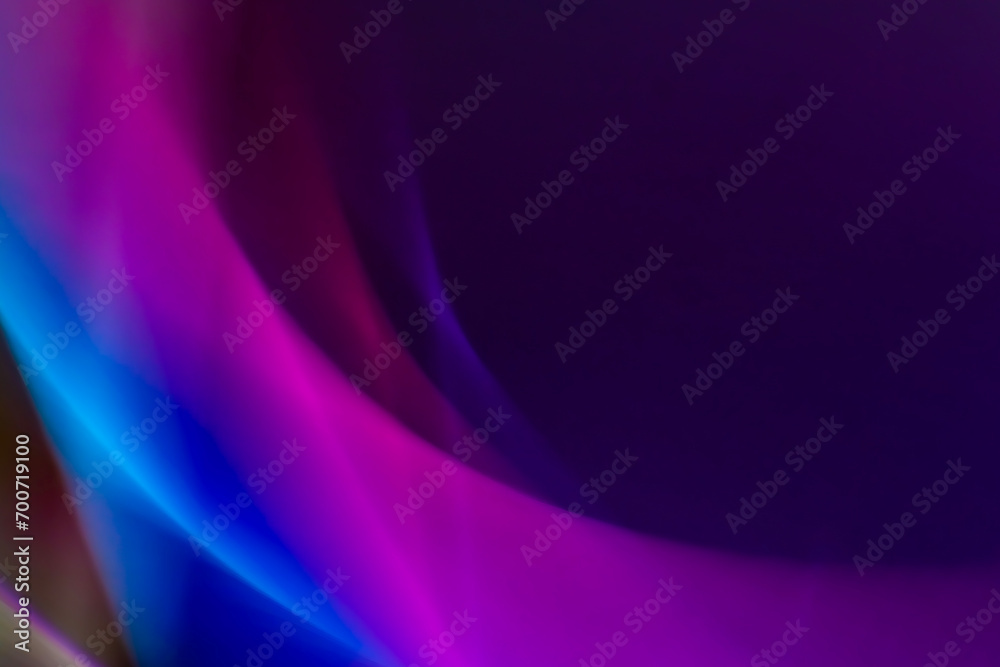 Abstract background with colored lines and blur effect of purple and blue colors. Gradients, waves and twisting. Abstract background with colored lines and blur effect of purple and blue colors. Gradients, waves and twisting.
