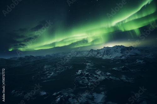 Aerial shot of the Northern Lights in Iceland - Travel to otherworldly landscapes, views from above © Лариса Лазебная
