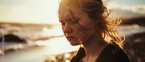 Close up beautiful girl smooth sunlight by the sea photo