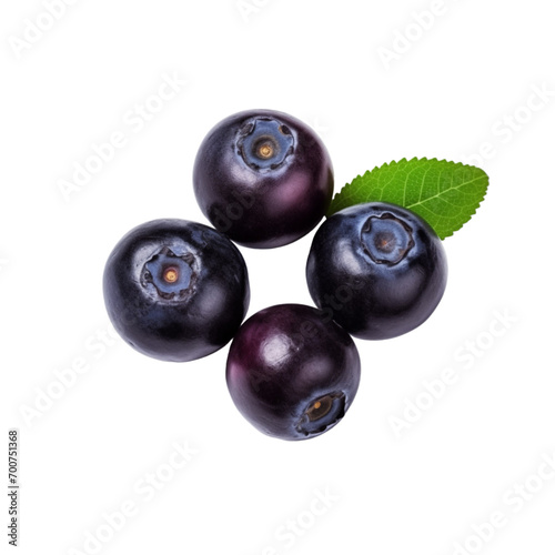 fresh organic huckleberry cut in half sliced with leaves isolated on white background with clipping path photo