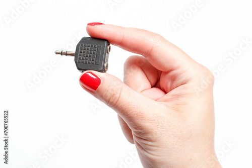 Audio connector holds a female hand