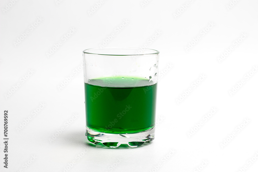 Glass with water on a white background Glass with water on a white background