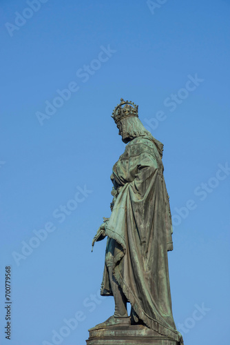Obraz na płótnie Bronze statue of King Charles IV at Krizovnicke Square, near Charles Bridge in Prague, Czech Republic, in sunny day w salonie