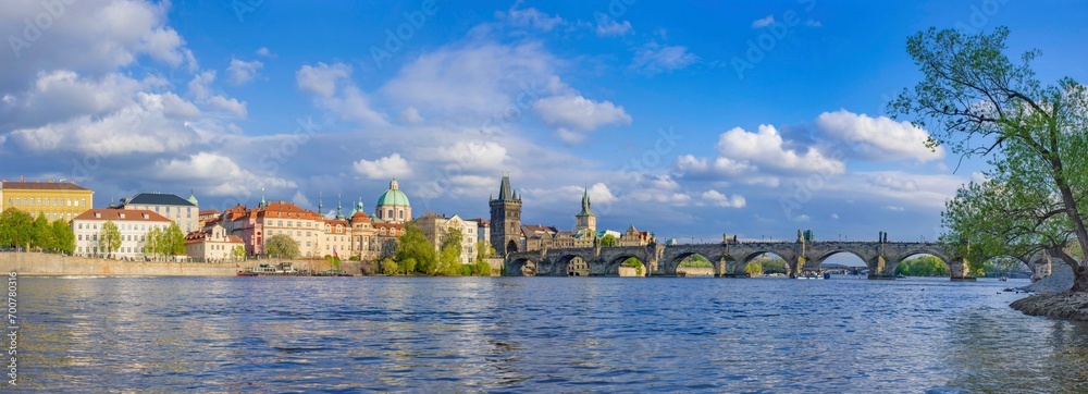 Panorama of old town with Charles Bridge on Vltava river and Old Town Bridge Tower, famous tourist destination in Prague, Czech Republic