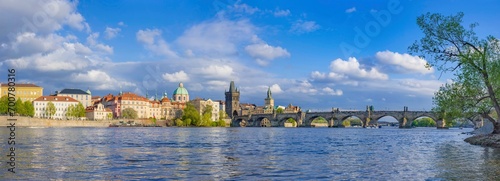 Obraz na płótnie Panorama of old town with Charles Bridge on Vltava river and Old Town Bridge Tower, famous tourist destination in Prague, Czech Republic w salonie