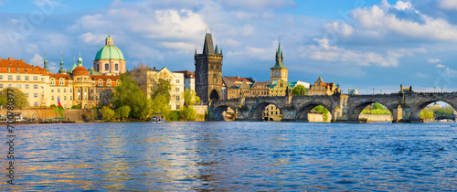 Obraz na płótnie Panorama of old town with Charles Bridge on Vltava river and Old Town Bridge Tower, famous tourist destination in Prague, Czech Republic w salonie