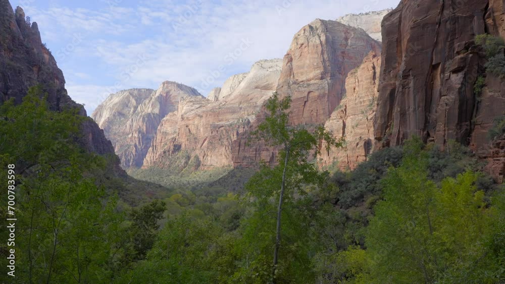 Establishing shot of mountains with red rocks in Weeping Rock, Zion National Park, Utah, North America. Day time. ProRes 422 HQ. Establishing shot of mountains with red rocks in Weeping Rock, Zion National Park, Utah, North America. Day time. ProRes 422 HQ.