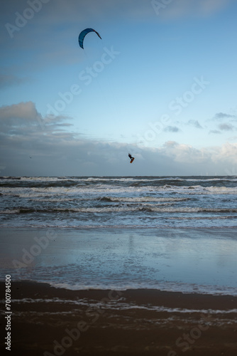 Kite boarding at the North Sea during the winter. 
