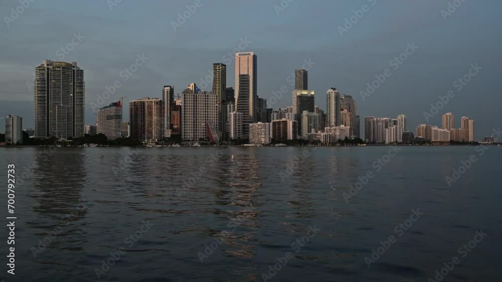 Timelapse of City of Miami, Florida skyline reflected in Biscayne Bay in evening twilight 4K. Timelapse of City of Miami, Florida skyline reflected in Biscayne Bay in evening twilight 4K.