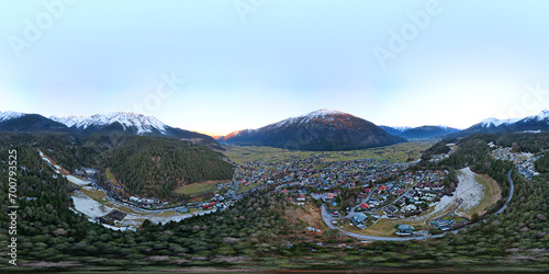 Aerial landscape view of the town Tarrenz in Austria with alps. 360 degrees panorama. Winter. photo