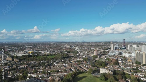 Aerial drone video of the outskirts of London on a sunny day.